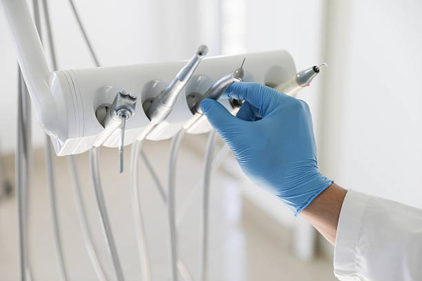 Professional Tooth Extraction technician working in Lexington, OH